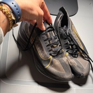 Black and Gold Athletic Shoes